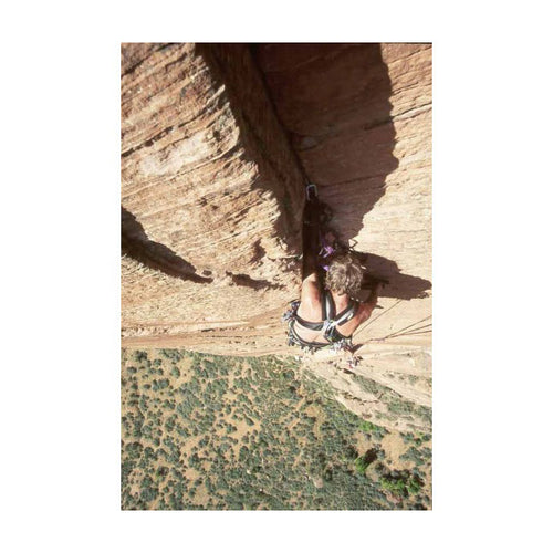 Climber Rock Climbing With Harness