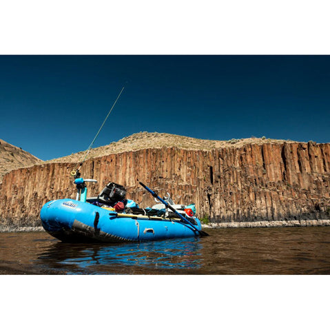 Outcast PAC 1400 Self-Bailing Raft fishing on a river