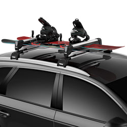 Thule SnowPack Extender Ski/Snowboard Roof Rack installed on a car