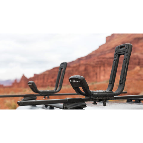 Kuat Class 2 J Cradle Roof Rack Kayak Carrier in Black installed on a roof rack
