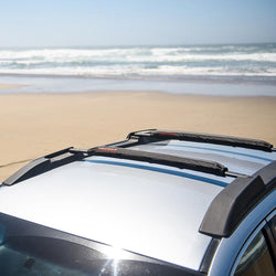 Yakima CrossBar Pads on a car at the beach
