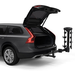 Thule Apex XT Swing 4 Bike Rack installed on a car angle