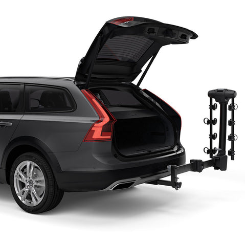 Thule Apex XT Swing 4 Bike Rack installed on a car angle