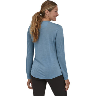 Patagonia Women's Capilene Cool Merino Graphic Long Sleeve Shirt in Fitz Roy Fader/Terra Pink model back