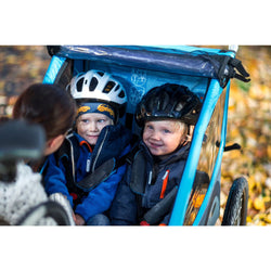 Thule Coaster XT Bicycle Trailer with two kids