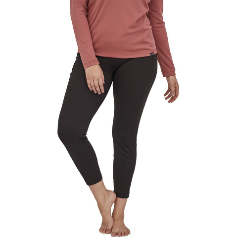 Patagonia Women's Capilene Mid Weight Bottoms in Black model view front