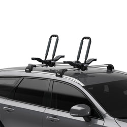 Thule Compass Kayak Roof Rack installed on a car