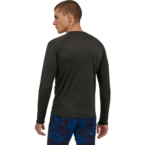 Patagonia Men's Capilene Mid Weight Crew Shirt in Black model view back