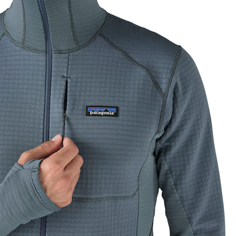 Patagonia Men's R1 Pullover Hoody close up of zippered chest pocket