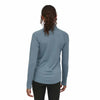 Patagonia Women's Capilene Mid Weight Zip Neck Shirt in Light Plume Grey model view back