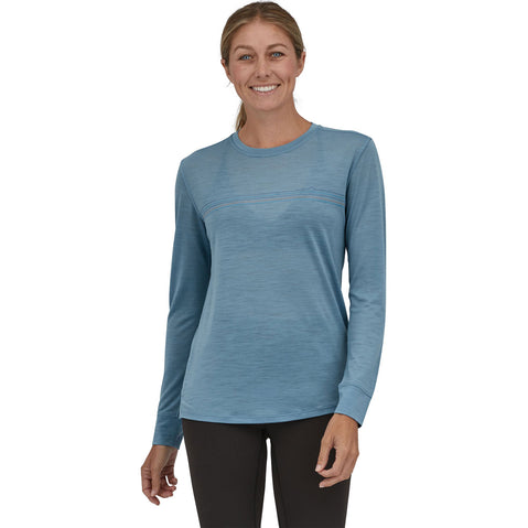 Patagonia Women's Capilene Cool Merino Graphic Long Sleeve Shirt in Fitz Roy Fader/Terra Pink model front