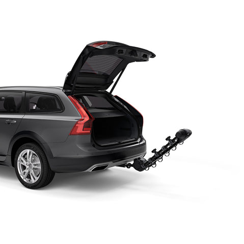 Thule Apex XT 5 Bike Hitch Rack installed on a car close open