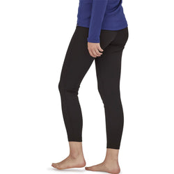 Patagonia Women's Capilene Mid Weight Bottoms in Black model view side