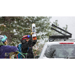 Kuat Switch 6 Ski/Snowboard Roof Rack loading skis