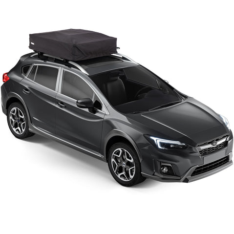 Thule Approach Roof Top Tent folded up on top of car angle view