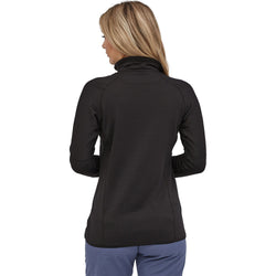 Patagonia Women's R1 Pullover Top model in black facing away