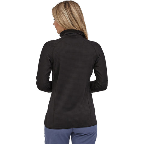 Patagonia Women's R1 Pullover Top model in black facing away