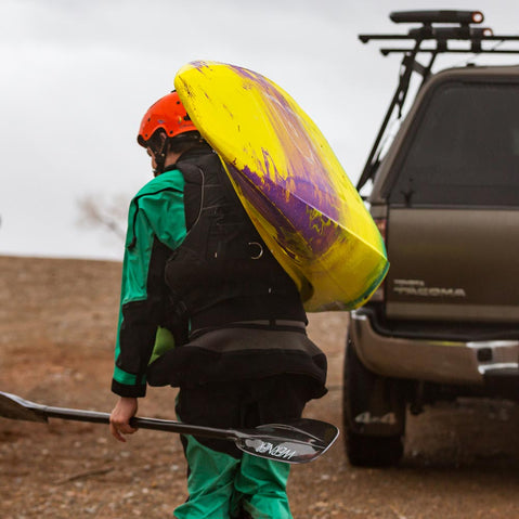 Kuat Class 4 Folding J Cradle Roof Rack Kayak Carrier kayaker walking up