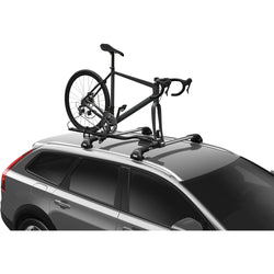 Thule FastRide Bike Roof Rack in Black with bike loaded on top of car