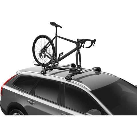Thule FastRide Bike Roof Rack in Black with bike loaded on top of car