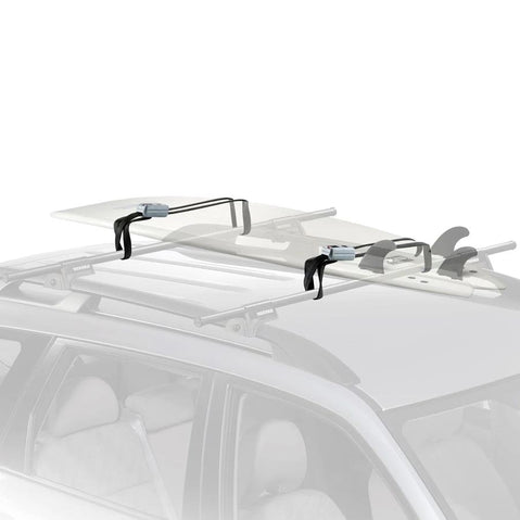 Yakima Ripcord Locking Tie-Down Straps installed on a car angle